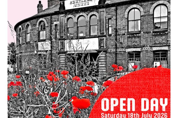 Black and white Image of Portland Works taken from across the road. Highlighted by a sea of red poppies