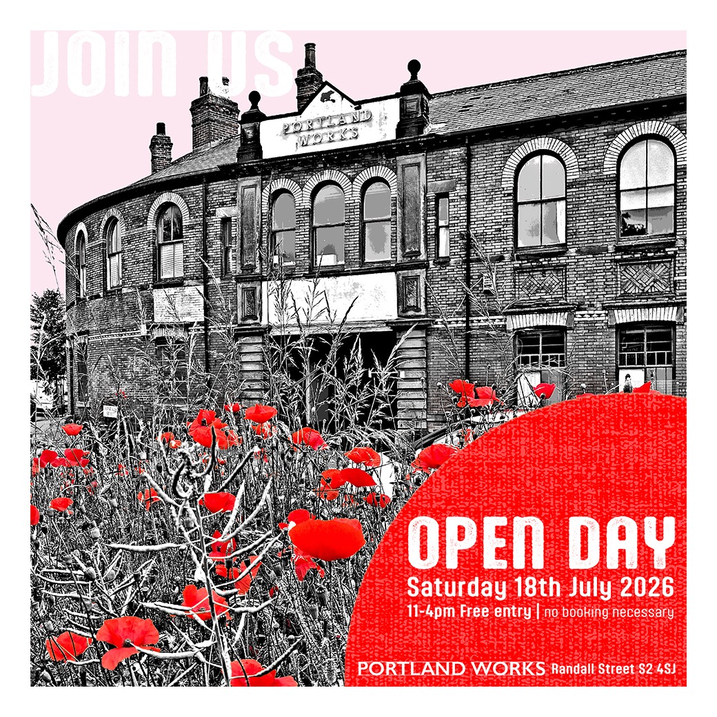 Black and white Image of Portland Works taken from across the road. Highlighted by a sea of red poppies